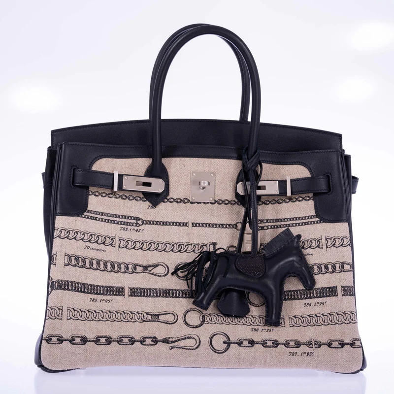A LIMITED EDITION TOILE DE CAMP DÉCHAÎNÉE & BLACK SWIFT LEATHER BIRKIN 35 WITH PALLADIUM HARDWARE 3 A LIMITED EDITION TOILE DE CAMP DÉCHAÎNÉE & BLACK SWIFT LEATHER BIRKIN 35 WITH PALLADIUM HARDWARE - Image 3